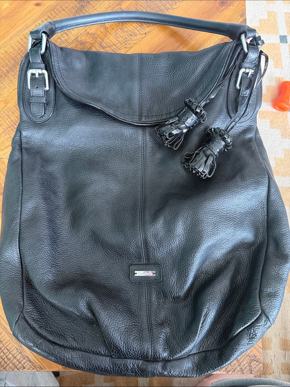 Black Leather Shoulder Hobo Bag with Tassel Accents